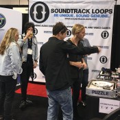 Richie Hawtin Listening to Jasons sale pitch, while Stacey Bladez and Jeff from Let It Rock have a beer